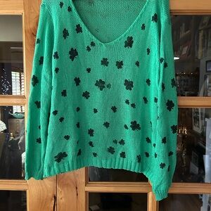 Wooden Ships Green V-Neck Sweater with Black Floral Design